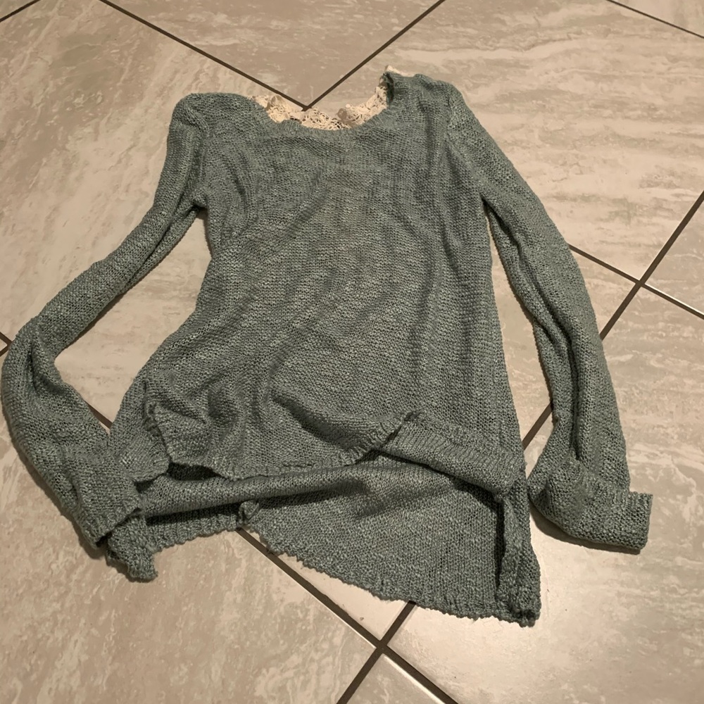 Green and white sweater